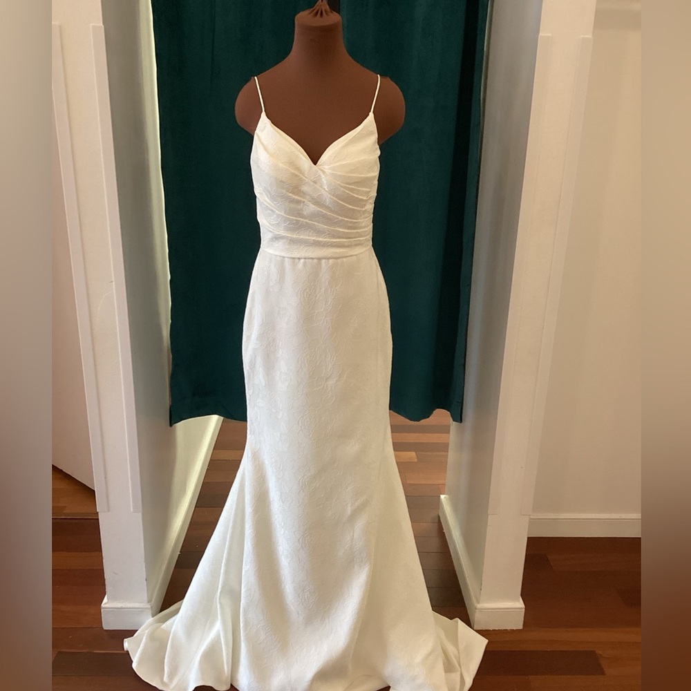 Carrafina brocade v-neck fit and flare gown